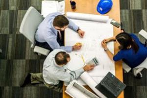 people at a table in a meeting