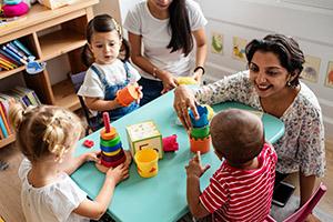 Teachers with toddlers in child care setting