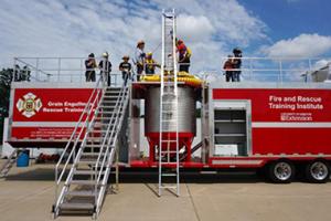 Fire fighters training a rescue in a grain elevator.