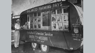 Man standing next to a food truck