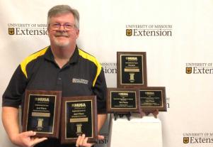 Greene County community development specialist David Burton received five national awards at the 2022 Neighboring USA conference in Little Rock, Arkansas.